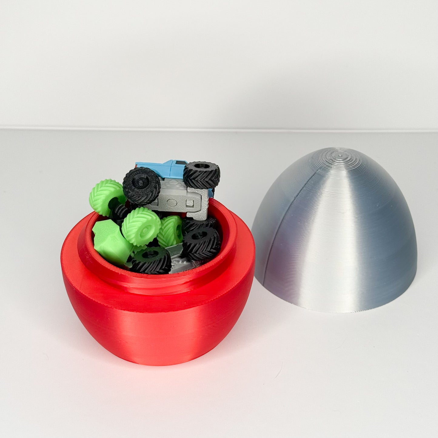 Monster Truck Surprise Egg โ 4 Mini Articulated Trucks! Perfect for Easter Baskets & Birthday Gifts!