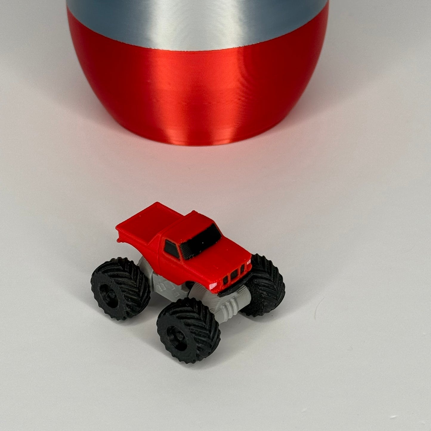 Monster Truck Surprise Egg โ 4 Mini Articulated Trucks! Perfect for Easter Baskets & Birthday Gifts!