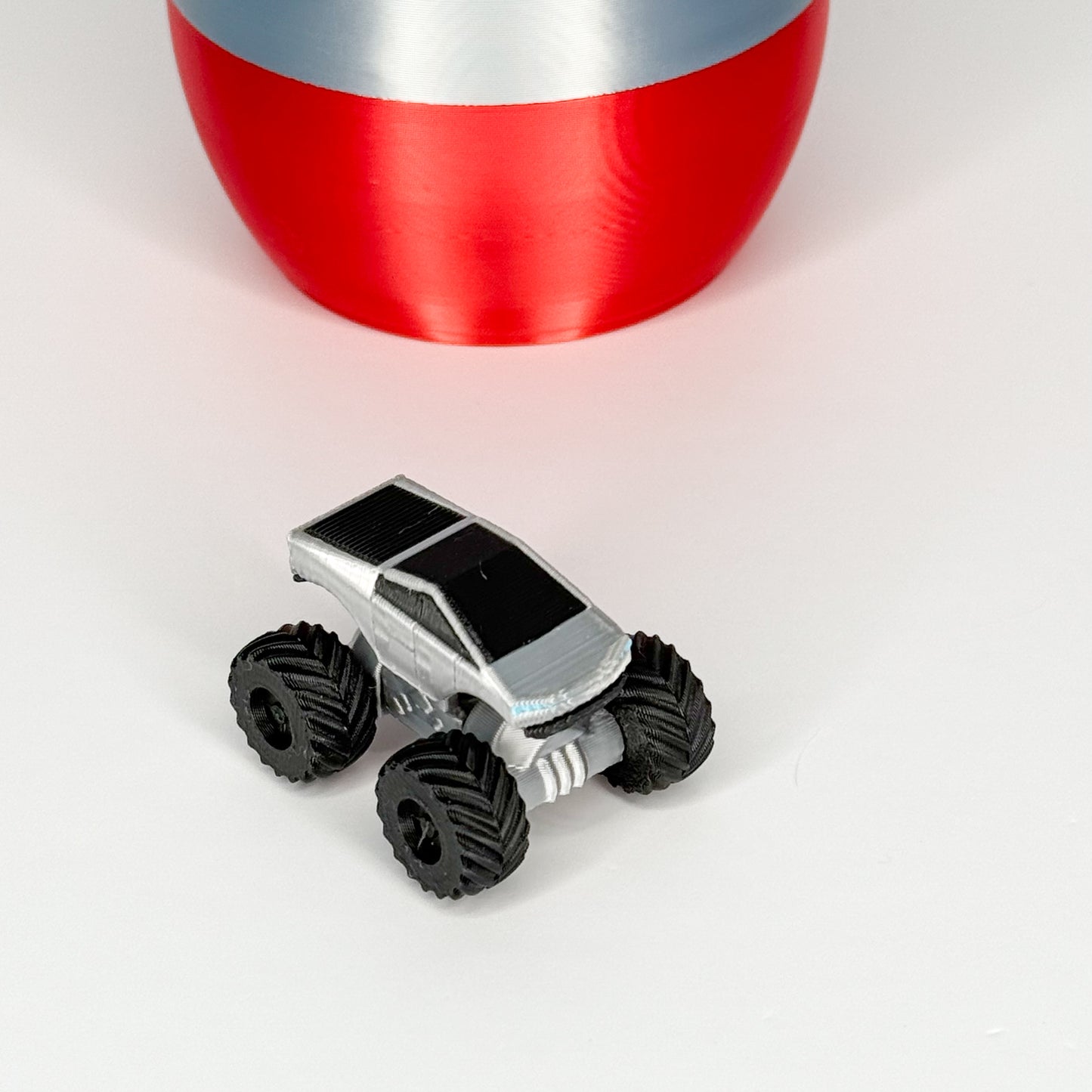Monster Truck Surprise Egg โ 4 Mini Articulated Trucks! Perfect for Easter Baskets & Birthday Gifts!
